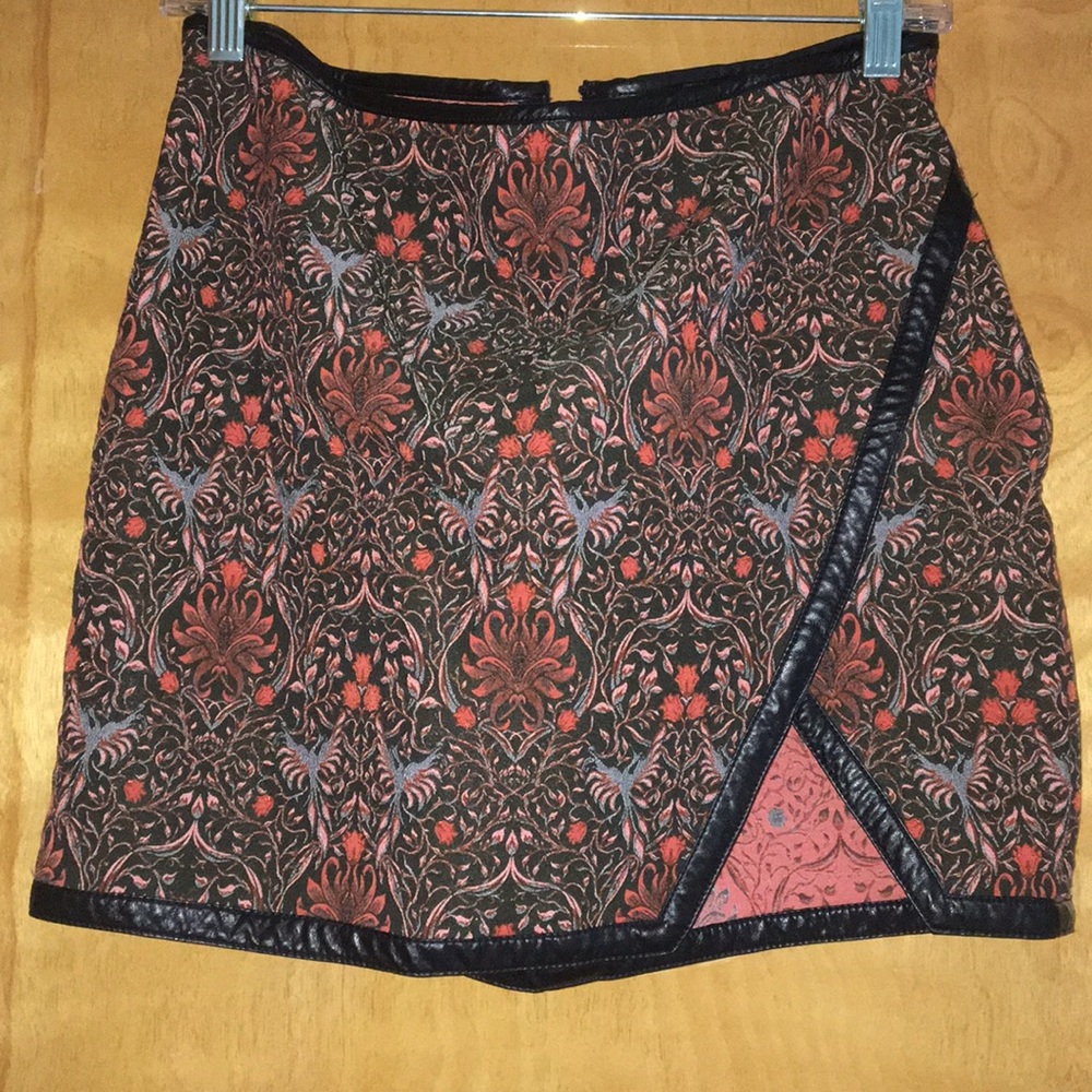 Black and orange pattered mini skirt